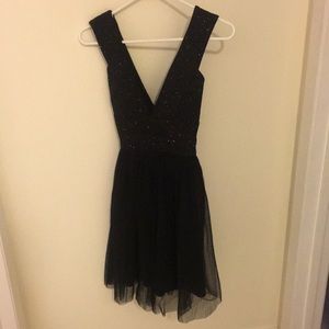 Black dress with glitter and tule. NWOT